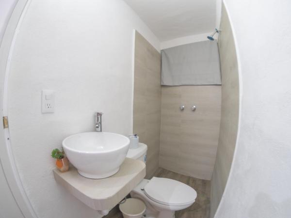 Hotel San Carlos : photo 4 de la chambre chambre deluxe (2 adultes + 1 enfant)