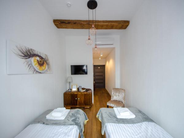 Apartamenty Mieszczańskie u Gołębiewskich : photo 6 de la chambre chambre lits jumeaux spacieuse