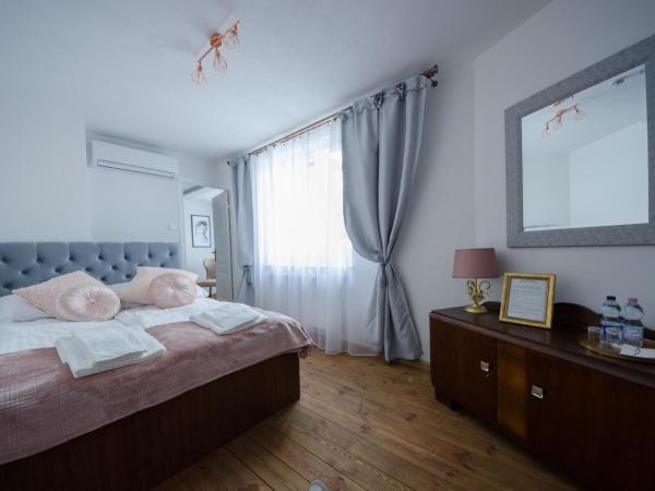 Apartamenty Mieszczańskie u Gołębiewskich : photo 9 de la chambre chambre quadruple deluxe