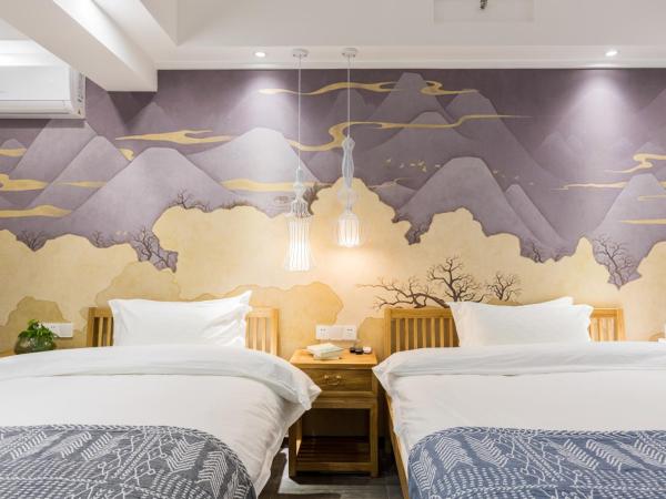 Chongqing Ouranjian Lake View Guesthouse : photo 4 de la chambre chambre lits jumeaux