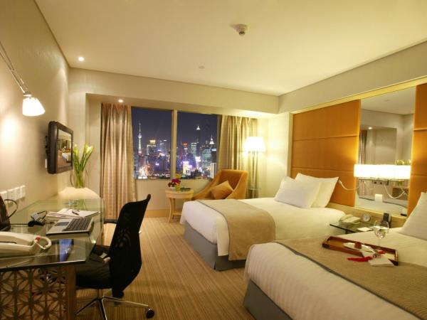 Jin Jiang Tower : photo 4 de la chambre chambre lits jumeaux deluxe - vue sur ville