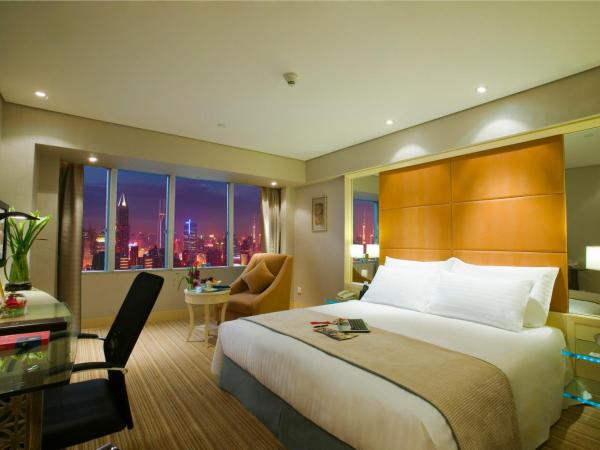 Jin Jiang Tower : photo 1 de la chambre chambre lit king-size de luxe numérique