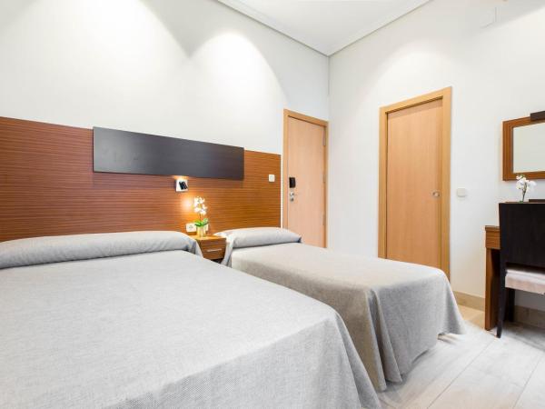 Hostal Cervelo : photo 2 de la chambre chambre lits jumeaux