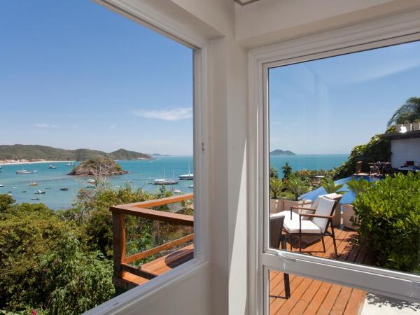 Abracadabra Pousada : photo 4 de la chambre loft suite with bathtub and sea view