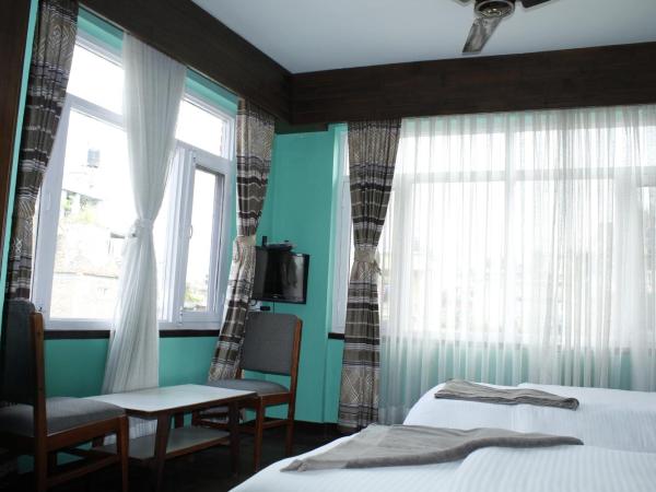 Mount Annapurna Guest House : photo 3 de la chambre chambre lits jumeaux