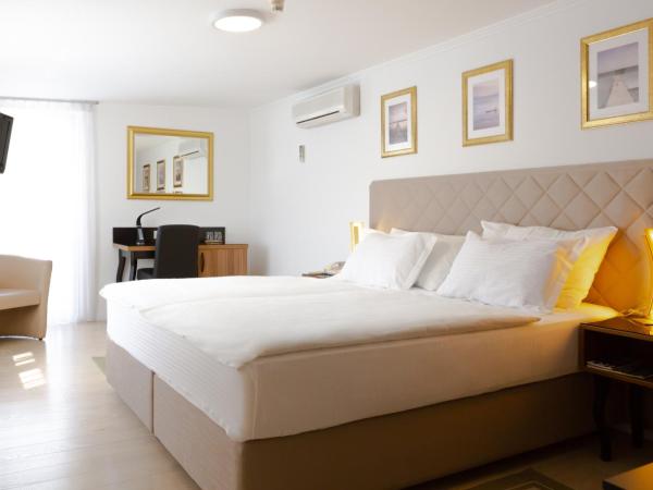 Hotel Vila Tina : photo 1 de la chambre chambre double deluxe