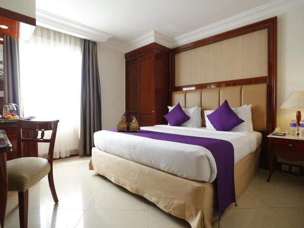 Arion Suites Hotel Kemang : photo 1 de la chambre chambre supérieure lit queen-size