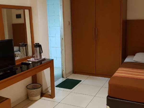 Hotel Dequr Jakarta Kota : photo 9 de la chambre chambre deluxe double ou lits jumeaux