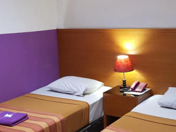 Hotel Dequr Jakarta Kota : photo 2 de la chambre chambre deluxe double ou lits jumeaux