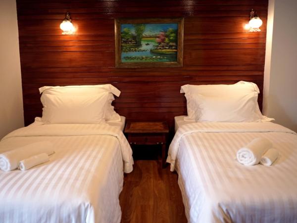 Ingmon House : photo 1 de la chambre chambre avec 2 grands lits queen-size 