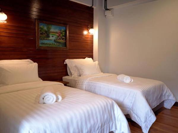 Ingmon House : photo 2 de la chambre chambre avec 2 grands lits queen-size 