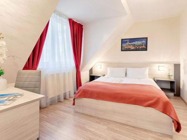 Triple M Hotel : photo 6 de la chambre petite chambre double ou lits jumeaux