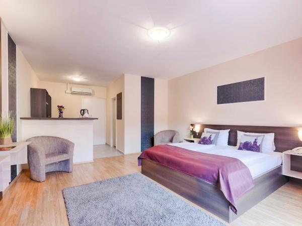 Triple M Hotel : photo 5 de la chambre grande chambre double