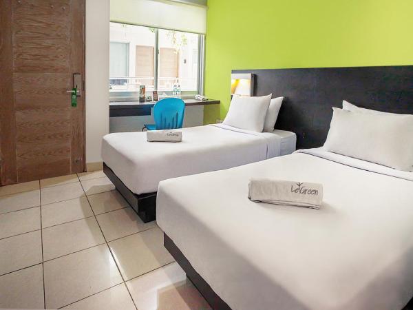 LeGreen Suite Tondano : photo 6 de la chambre chambre double supérieure