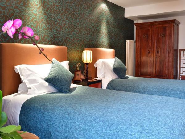 Jingshan Garden Hotel : photo 2 de la chambre chambre lits jumeaux - vue sur cour