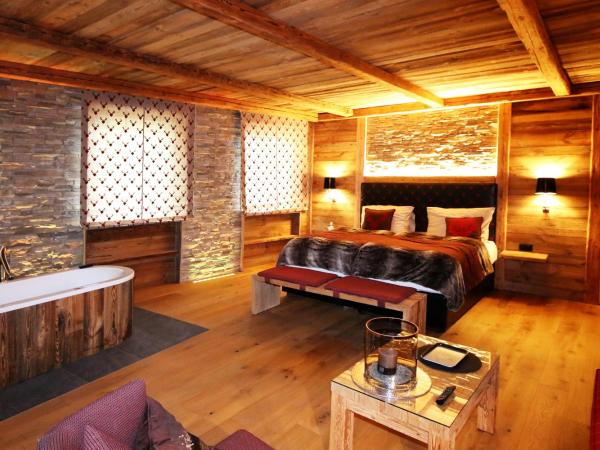 Amber Ski-in/out Hotel & Spa : photo 1 de la chambre suite deluxe avec lit king-size