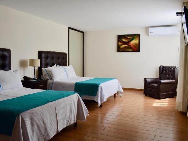 Country Hotel & Suites : photo 1 de la chambre chambre lits jumeaux standard