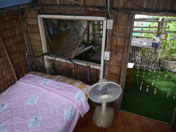 New Phiman Riverview Guesthouse : photo 4 de la chambre cottage - vue sur jardin