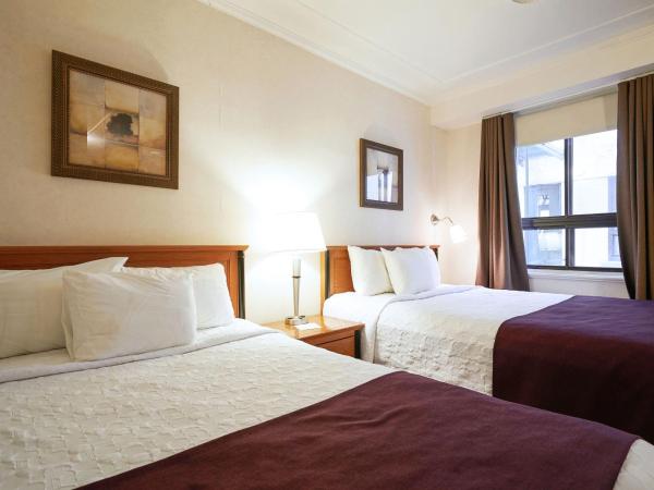 Hotel St-Denis : photo 3 de la chambre chambre deluxe avec 2 lits doubles