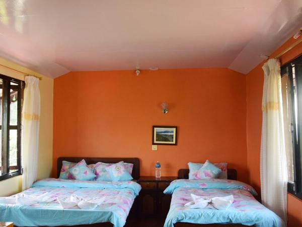 Siddhartha Garden Ayurveda : photo 9 de la chambre chambre double ou lits jumeaux - vue sur montagnes