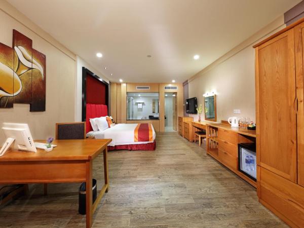 Guangzhou The Royal Garden Hotel : photo 1 de la chambre chambre lit king-size de luxe - vue sur jardin