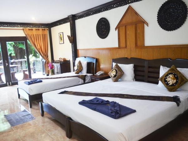 Paradise Pearl Bungalows : photo 4 de la chambre chambre triple deluxe