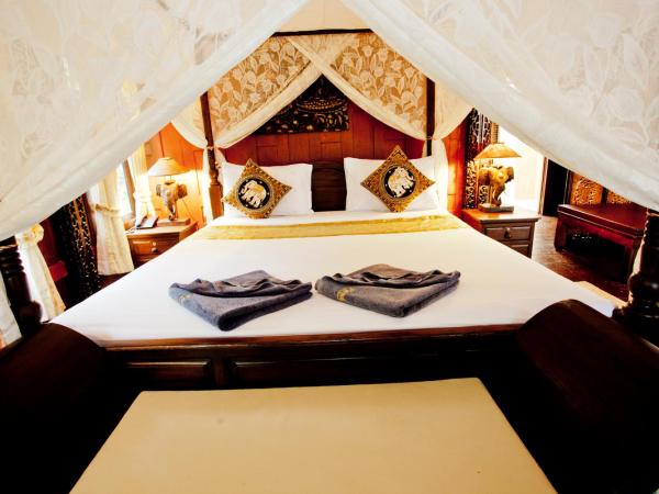 Paradise Pearl Bungalows : photo 1 de la chambre chambre lit king-size - vue sur mer