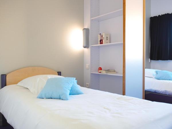 JF Accueil & Formation : photo 1 de la chambre chambre lits jumeaux avec salle de bains privative