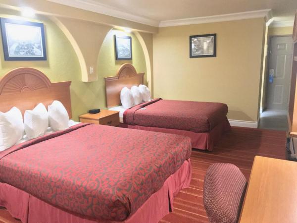 Days Inn by Wyndham San Antonio Airport : photo 1 de la chambre chambre avec 2 lits queen-size nqq1 - non-fumeurs