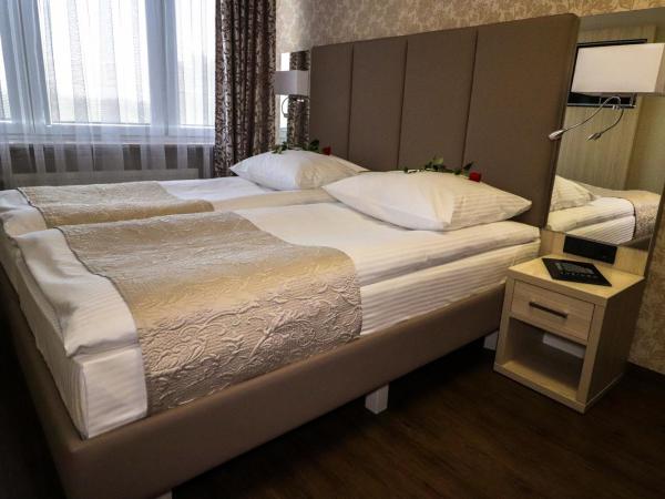 Kompleks restauracyjno-noclegowy Rubikon : photo 6 de la chambre chambre double ou lits jumeaux avec salle de bains