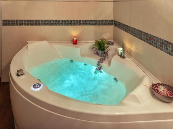 Il Dolce Sospiro : photo 7 de la chambre chambre lit queen-size avec baignoire spa