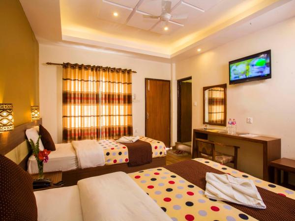 Hotel Trip Pokhara : photo 3 de la chambre chambre quadruple standard