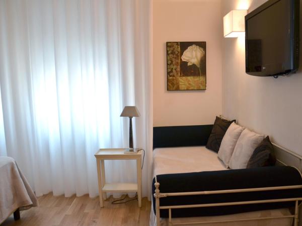 Hotel Mastino : photo 1 de la chambre chambre triple