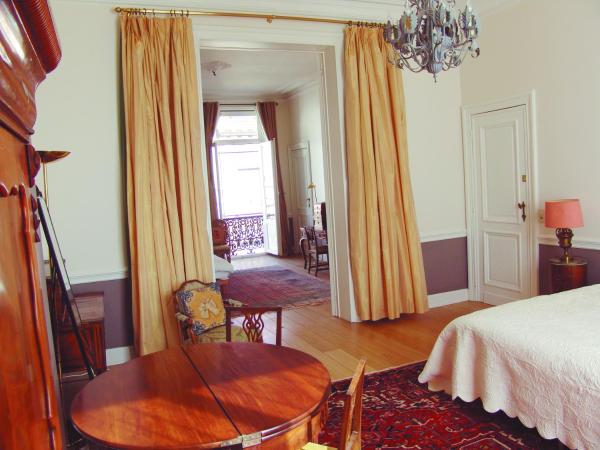 Louise Chatelain suites : photo 1 de la chambre chambre familiale - vue sur jardin