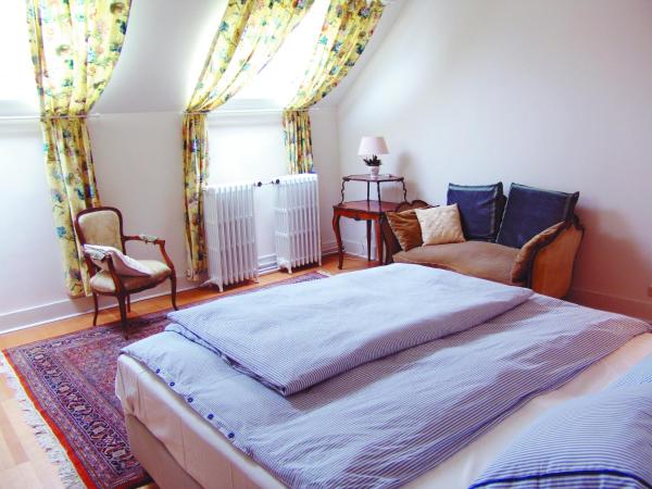 Louise Chatelain suites : photo 8 de la chambre chambre familiale - vue sur jardin