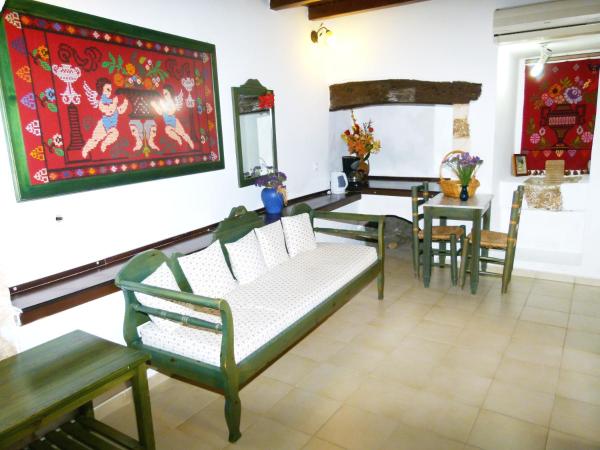 Madonna Studios : photo 3 de la chambre chambre double ou lits jumeaux deluxe – vue sur jardin