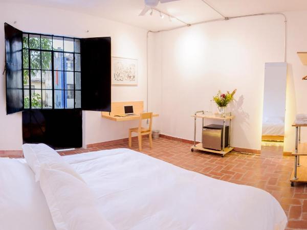 Agrado Guest House : photo 1 de la chambre suite master avec balcon