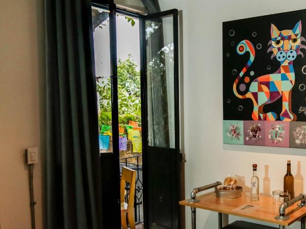 Agrado Guest House : photo 9 de la chambre chambre double - vue sur jardin