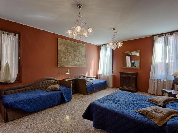 Hotel Guerrato : photo 3 de la chambre chambre quadruple