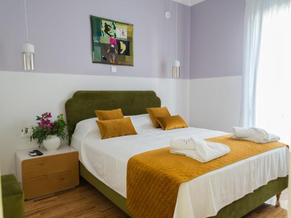 Neratzia Rooms : photo 8 de la chambre chambre quadruple avec balcon