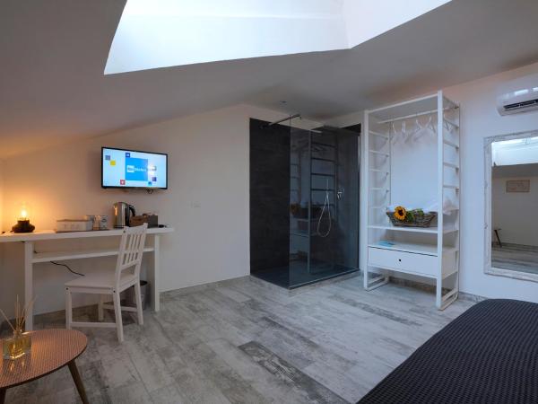 Approdo 36 : photo 2 de la chambre suite familiale