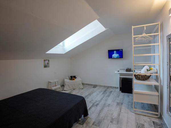 Approdo 36 : photo 2 de la chambre chambre double ou lits jumeaux avec salle de bains privative