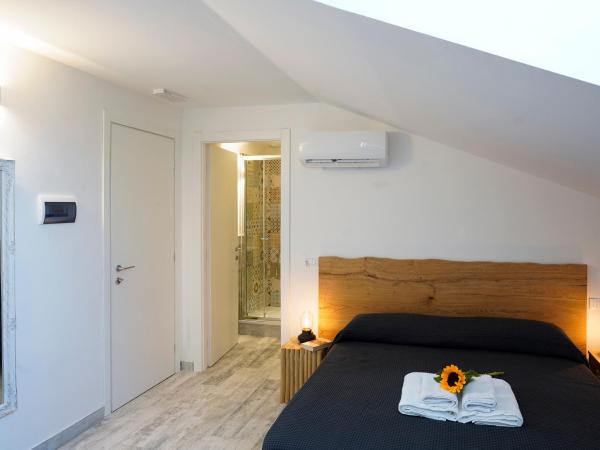 Approdo 36 : photo 9 de la chambre chambre double ou lits jumeaux avec salle de bains privative