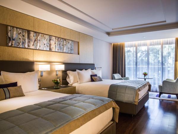 Palladio Hotel Buenos Aires - MGallery : photo 1 de la chambre suite deluxe avec 2 lits doubles et balcon - vue sur parc