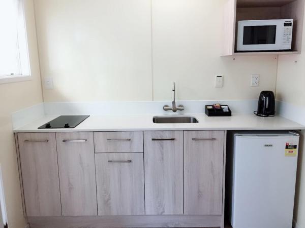 Rose Court Motel : photo 2 de la chambre grand studio