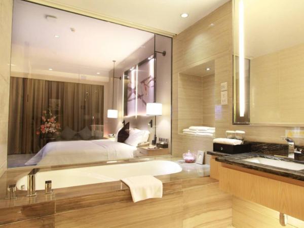 Shenzhen Shuidu Holiday Hotel, North Railway Station : photo 1 de la chambre chambre lit queen-size deluxe