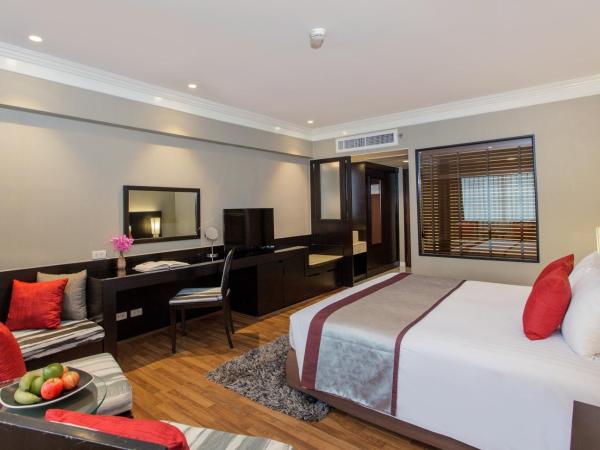 Ramada Plaza by Wyndham Bangkok Menam Riverside : photo 2 de la chambre chambre lit king-size de luxe - vue sur rivière