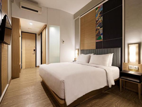 MaxOne Platinum Hayam Wuruk : photo 2 de la chambre happiness room double