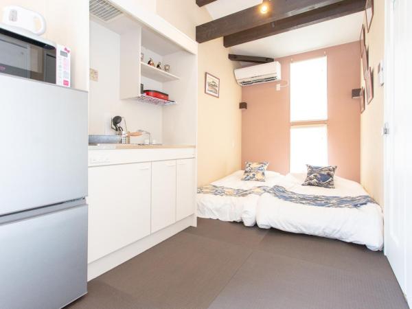 Tourisakuraann 2goukann : photo 1 de la chambre chambre familiale standard