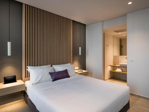 Trianon Luxury Apartments & Suites : photo 8 de la chambre suite 2 chambres supérieure